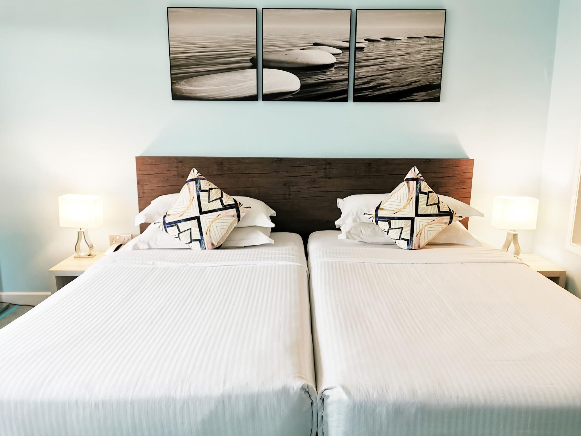 Thistle ג'והור בהרו מראה חיצוני תמונה A bedroom at the hotel